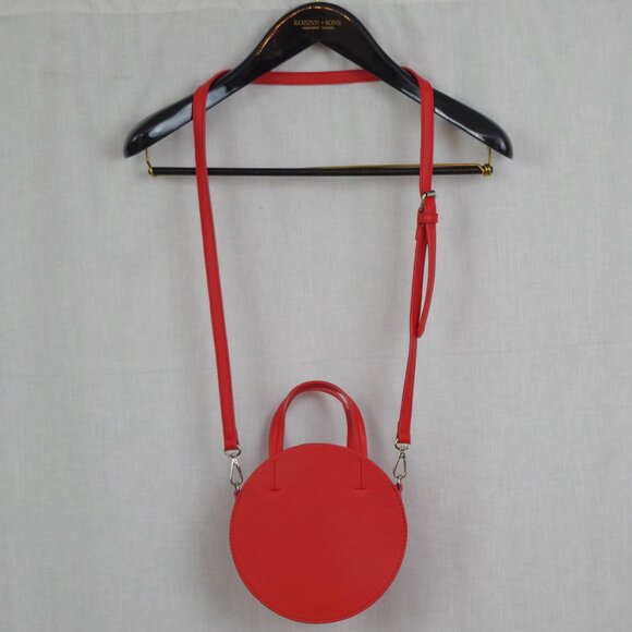 Urban Outfitters Handbags - UO Small Red Circular Crossbody Purse